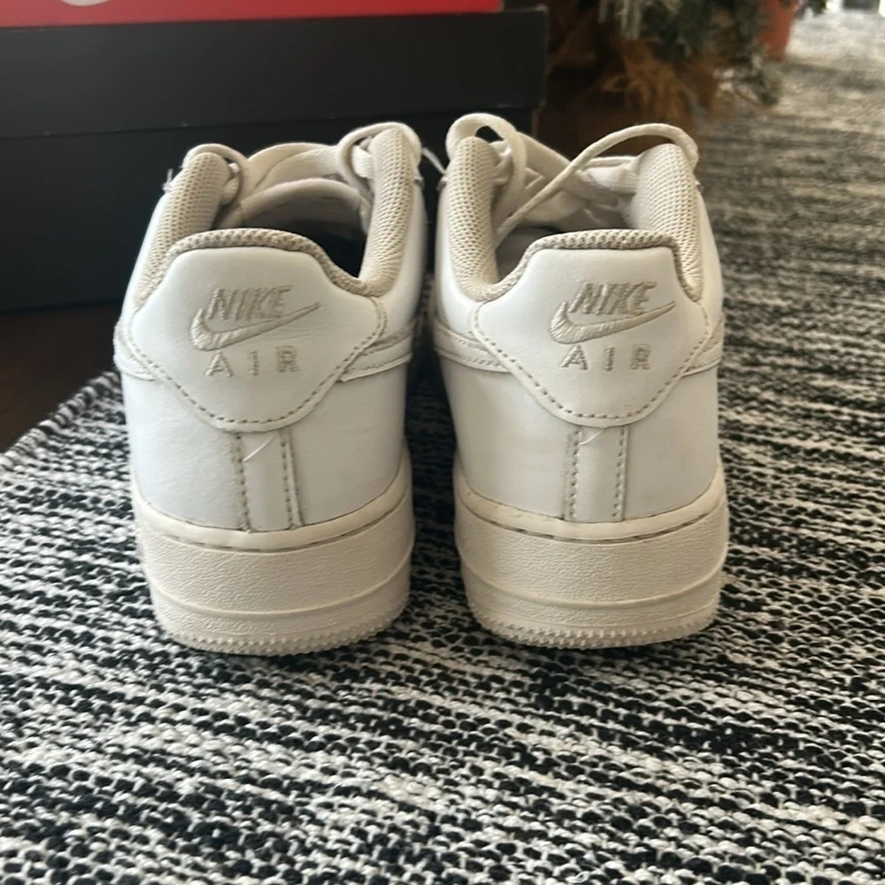All white Nike Air Force Ones size 6.5Y